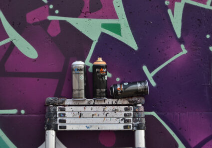 raw concrete on a sunny day with POISON GFR